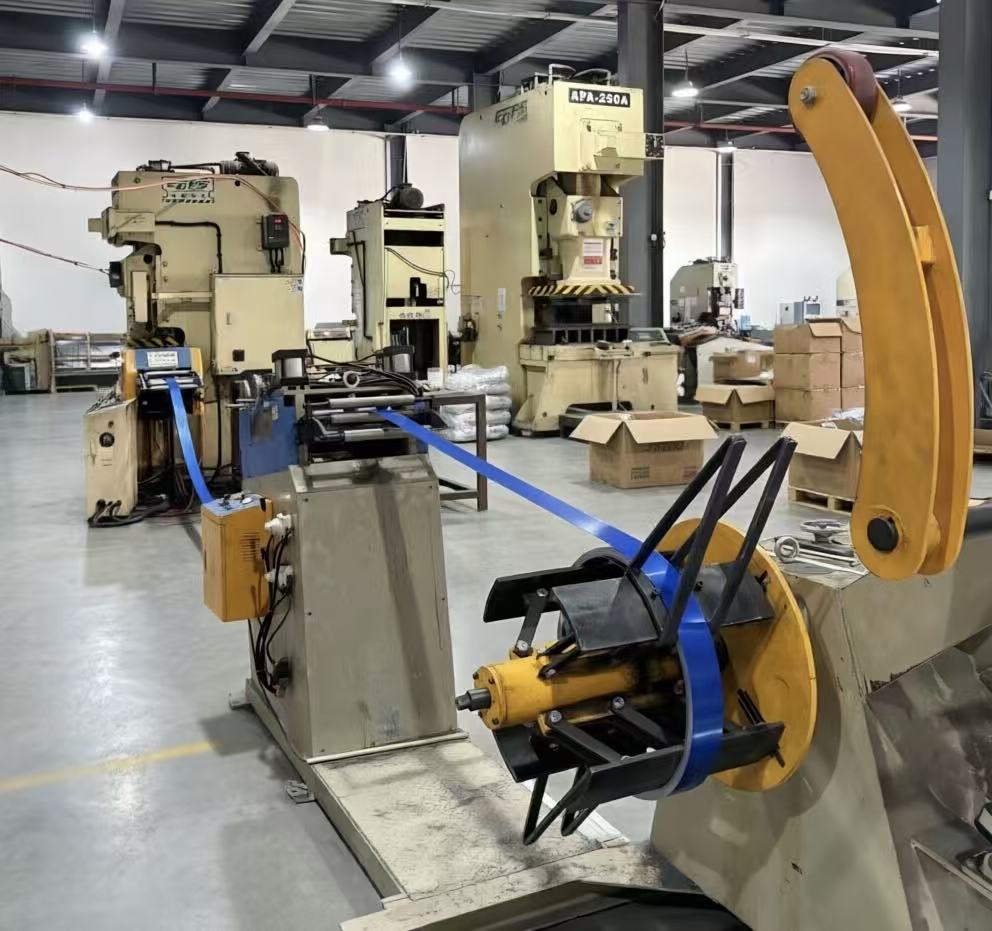 Automatic coil-feed stamping production line
